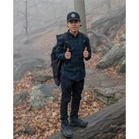 marcelino solano standing on a rock with both thumbs up